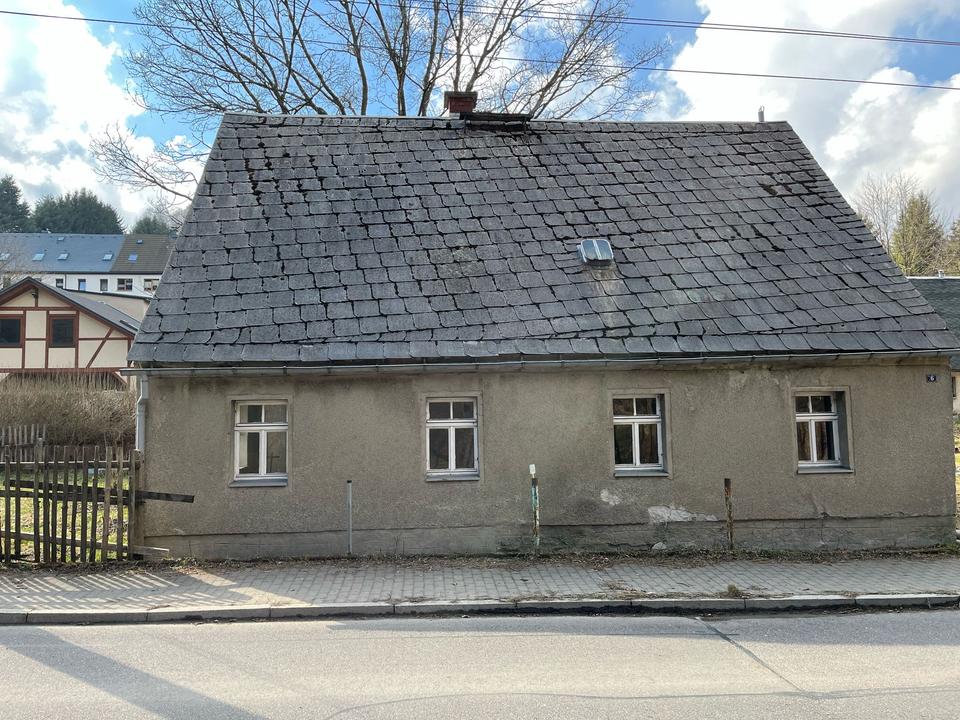 Baugrundstück mit Einfamilienhaus im schönen Sehmatal!